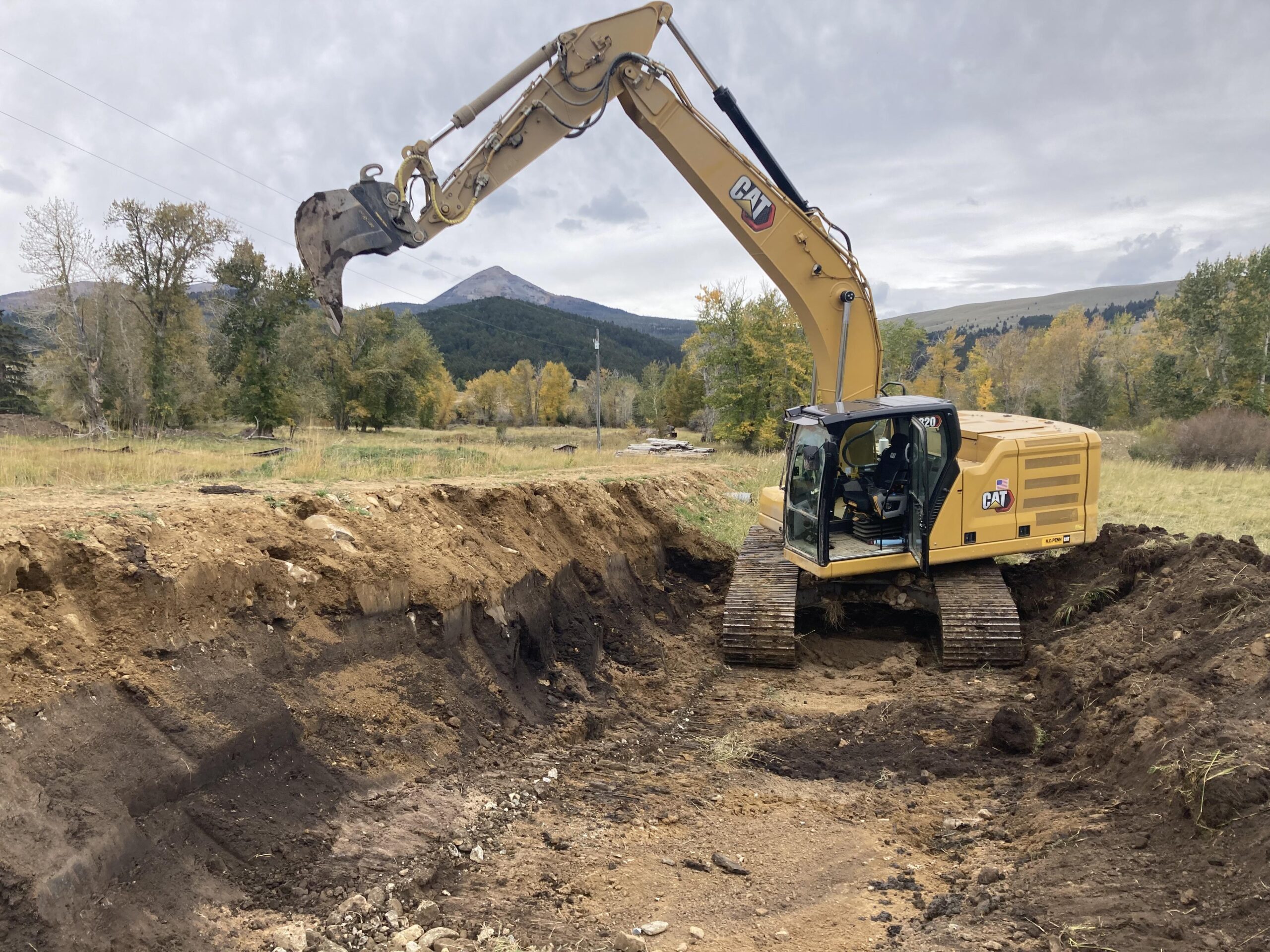 Stripping soil for a new road